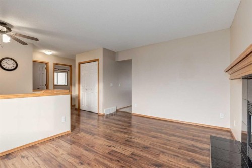 8 Canoe Circle Sw, Airdrie, AB - Indoor With Fireplace