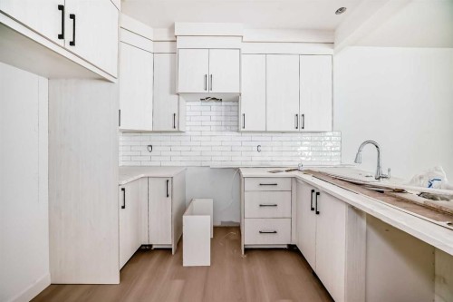 1971 Mccaskill Drive, Crossfield, AB - Indoor Photo Showing Kitchen With Upgraded Kitchen