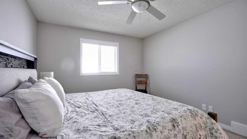 78 Athabasca Crescent, Crossfield, AB - Indoor Photo Showing Bedroom