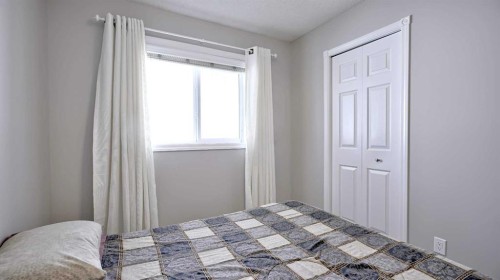 78 Athabasca Crescent, Crossfield, AB - Indoor Photo Showing Bedroom