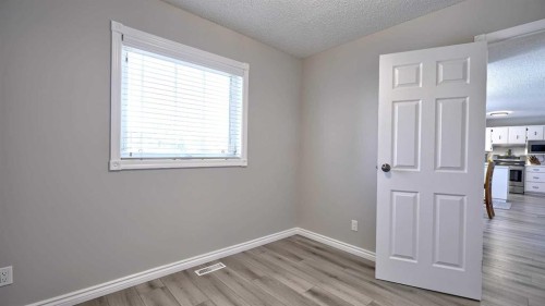78 Athabasca Crescent, Crossfield, AB - Indoor Photo Showing Other Room