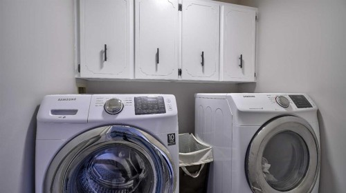 78 Athabasca Crescent, Crossfield, AB - Indoor Photo Showing Laundry Room