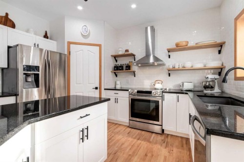 13 Bow Ridge Link, Cochrane, AB - Indoor Photo Showing Kitchen With Upgraded Kitchen