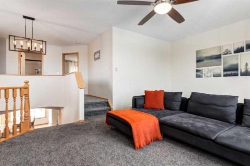 13 Bow Ridge Link, Cochrane, AB - Indoor Photo Showing Living Room