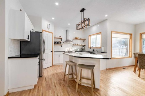13 Bow Ridge Link, Cochrane, AB - Indoor Photo Showing Kitchen With Upgraded Kitchen