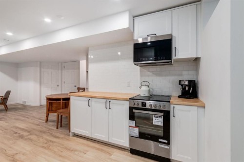 13 Bow Ridge Link, Cochrane, AB - Indoor Photo Showing Kitchen