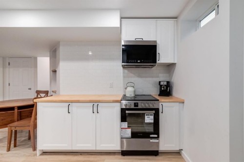 13 Bow Ridge Link, Cochrane, AB - Indoor Photo Showing Kitchen