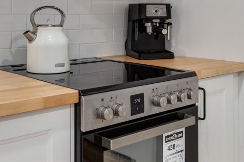 13 Bow Ridge Link, Cochrane, AB - Indoor Photo Showing Kitchen