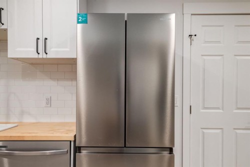 13 Bow Ridge Link, Cochrane, AB - Indoor Photo Showing Kitchen