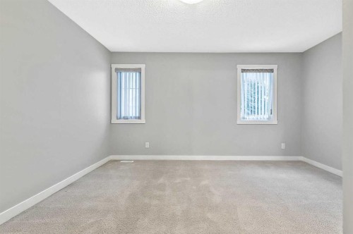 1305-2445 Kingsland Road Se, Airdrie, AB - Indoor Photo Showing Other Room