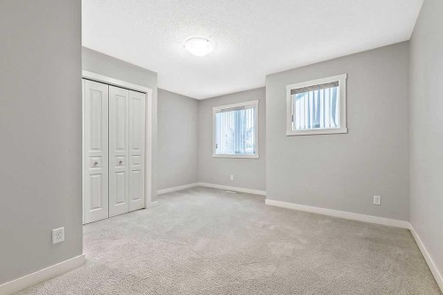 1305-2445 Kingsland Road Se, Airdrie, AB - Indoor Photo Showing Other Room