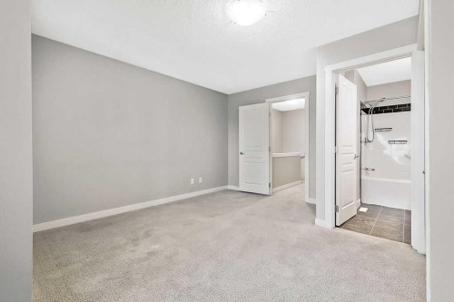 1305-2445 Kingsland Road Se, Airdrie, AB - Indoor Photo Showing Other Room
