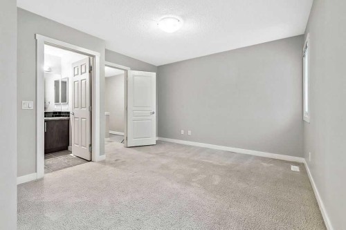1305-2445 Kingsland Road Se, Airdrie, AB - Indoor Photo Showing Other Room
