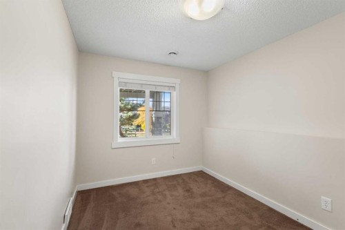 139 Coopers Hill Sw, Airdrie, AB - Indoor Photo Showing Other Room