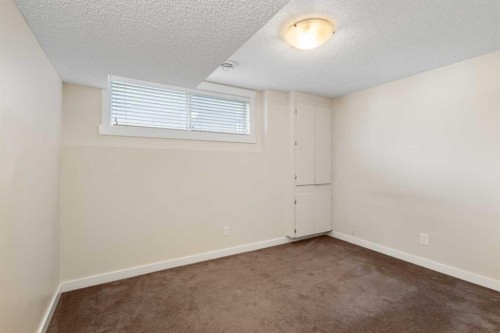 139 Coopers Hill Sw, Airdrie, AB - Indoor Photo Showing Other Room