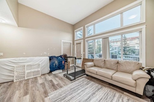 14 Dover Mews Se, Calgary, AB - Indoor Photo Showing Living Room