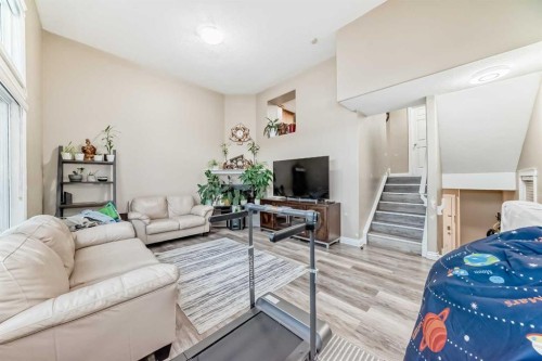14 Dover Mews Se, Calgary, AB - Indoor Photo Showing Living Room