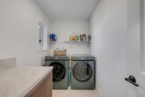 20 Edith Crescent Nw, Calgary, AB - Indoor Photo Showing Laundry Room