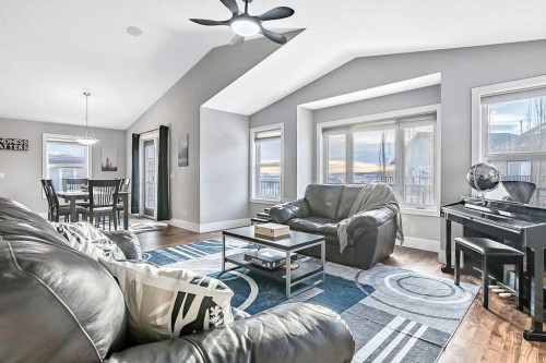 605 Sunrise Close, Diamond Valley, AB - Indoor Photo Showing Living Room