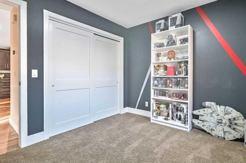 605 Sunrise Close, Diamond Valley, AB - Indoor Photo Showing Other Room