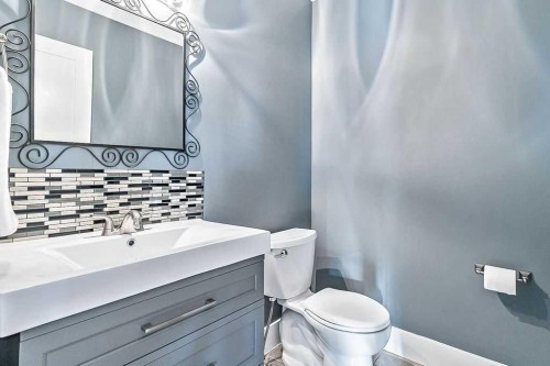 605 Sunrise Close, Diamond Valley, AB - Indoor Photo Showing Bathroom