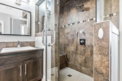 605 Sunrise Close, Diamond Valley, AB - Indoor Photo Showing Bathroom