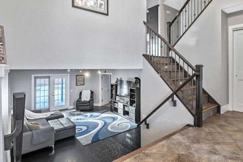 605 Sunrise Close, Diamond Valley, AB - Indoor Photo Showing Other Room