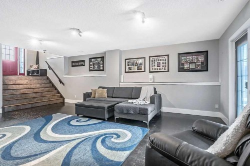 605 Sunrise Close, Diamond Valley, AB - Indoor Photo Showing Other Room