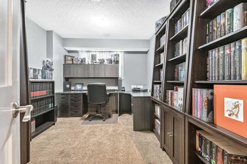 605 Sunrise Close, Diamond Valley, AB - Indoor Photo Showing Office