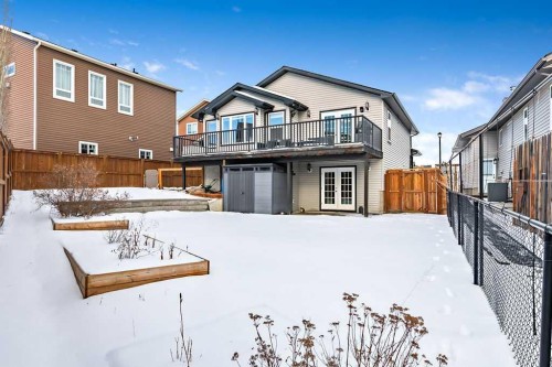 605 Sunrise Close, Diamond Valley, AB - Outdoor With Deck Patio Veranda With Exterior