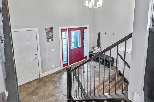 605 Sunrise Close, Diamond Valley, AB - Indoor Photo Showing Other Room