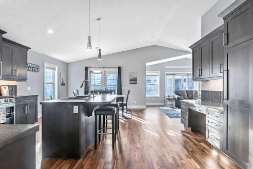 605 Sunrise Close, Diamond Valley, AB - Indoor Photo Showing Kitchen With Upgraded Kitchen