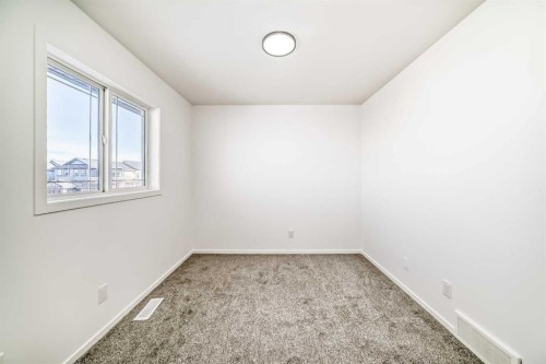 99 Saddlecrest Way Ne, Calgary, AB - Indoor Photo Showing Other Room
