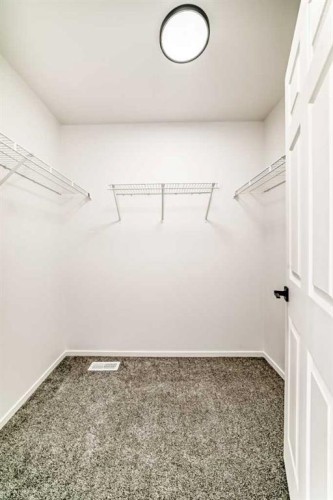 99 Saddlecrest Way Ne, Calgary, AB - Indoor With Storage