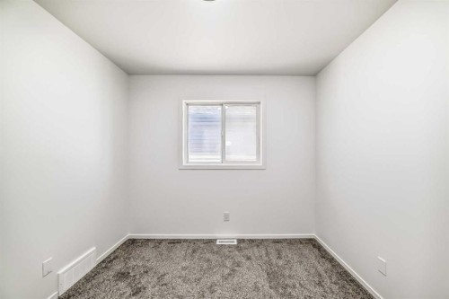 99 Saddlecrest Way Ne, Calgary, AB - Indoor Photo Showing Other Room