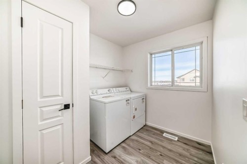 99 Saddlecrest Way Ne, Calgary, AB - Indoor Photo Showing Laundry Room