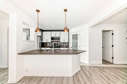 99 Saddlecrest Way Ne, Calgary, AB - Indoor Photo Showing Kitchen