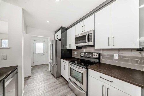 99 Saddlecrest Way Ne, Calgary, AB - Indoor Photo Showing Kitchen With Stainless Steel Kitchen