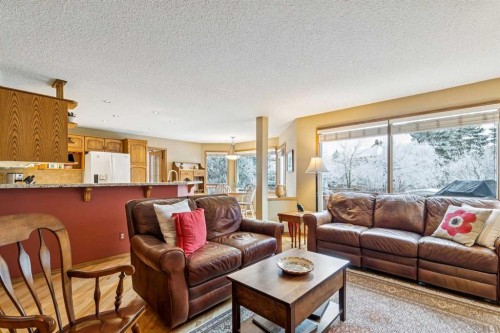 75 Shawnee Crescent, Calgary, AB - Indoor Photo Showing Living Room