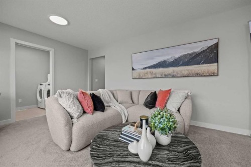 17 Tillotson Downs, Okotoks, AB - Indoor Photo Showing Living Room