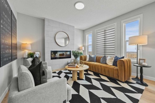 17 Tillotson Downs, Okotoks, AB - Indoor Photo Showing Living Room With Fireplace