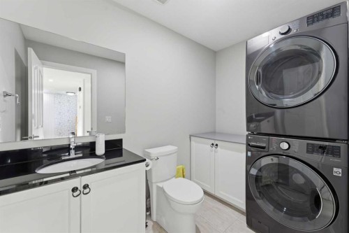 325 Bayside Place Sw, Airdrie, AB - Indoor Photo Showing Laundry Room
