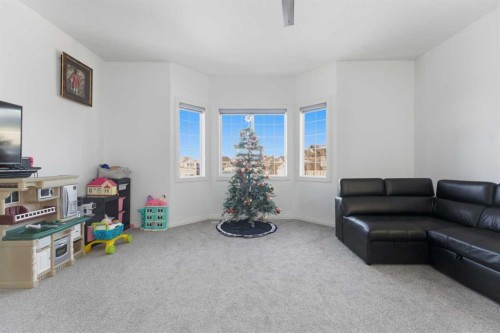 325 Bayside Place Sw, Airdrie, AB - Indoor Photo Showing Living Room