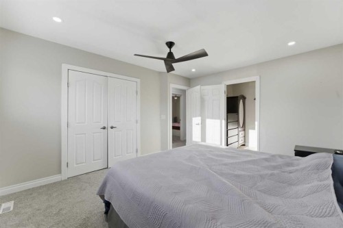325 Bayside Place Sw, Airdrie, AB - Indoor Photo Showing Bedroom