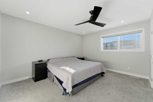 325 Bayside Place Sw, Airdrie, AB - Indoor Photo Showing Bedroom