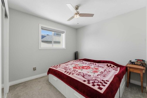 325 Bayside Place Sw, Airdrie, AB - Indoor Photo Showing Bedroom