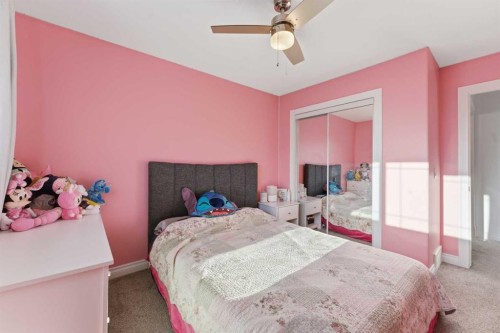 325 Bayside Place Sw, Airdrie, AB - Indoor Photo Showing Bedroom