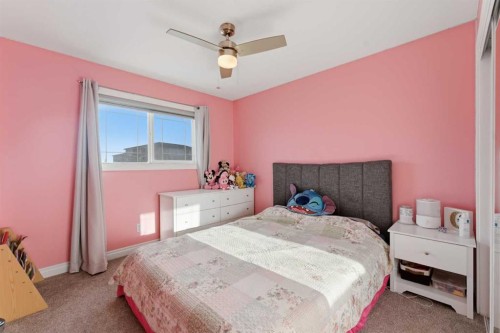 325 Bayside Place Sw, Airdrie, AB - Indoor Photo Showing Bedroom
