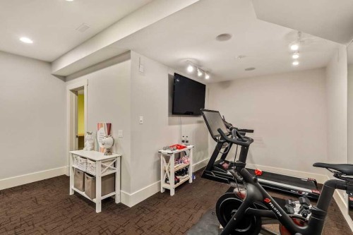 19 Sienna Ridge Bay Sw, Calgary, AB - Indoor Photo Showing Gym Room