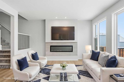 19815 44 Street Se, Calgary, AB - Indoor Photo Showing Living Room With Fireplace